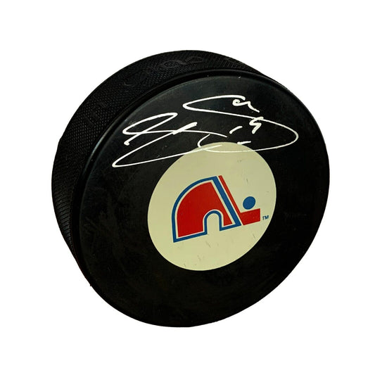 Joe Sakic Autographed Hockey Puck (Quebec Nordiques) - 643-collectibles