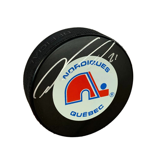 Peter Forsberg Autographed Hockey Puck (Quebec Nordiques) - 643-collectibles